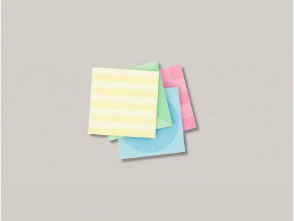 Mix produktů Samolepicí bloček Post-it na šedém pozadí